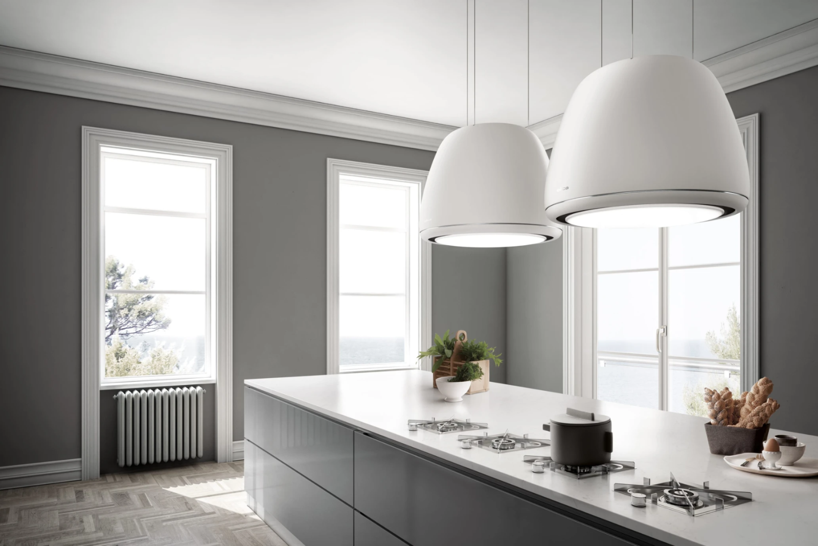 Máy hút mùi đảo đèn Elica kết hợp hoàn hảo giữa hút mùi và đèn trang trí, đẹp tinh tế, ấn tượng.